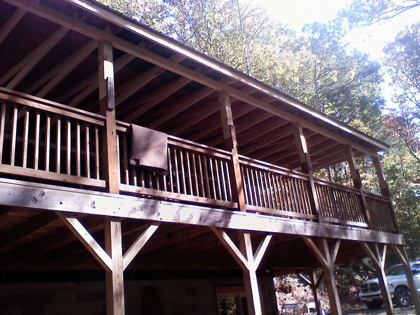 Timber framing under a new elevated porch and deck — Roof Leak Repair in Charles City by Roofing Brothers